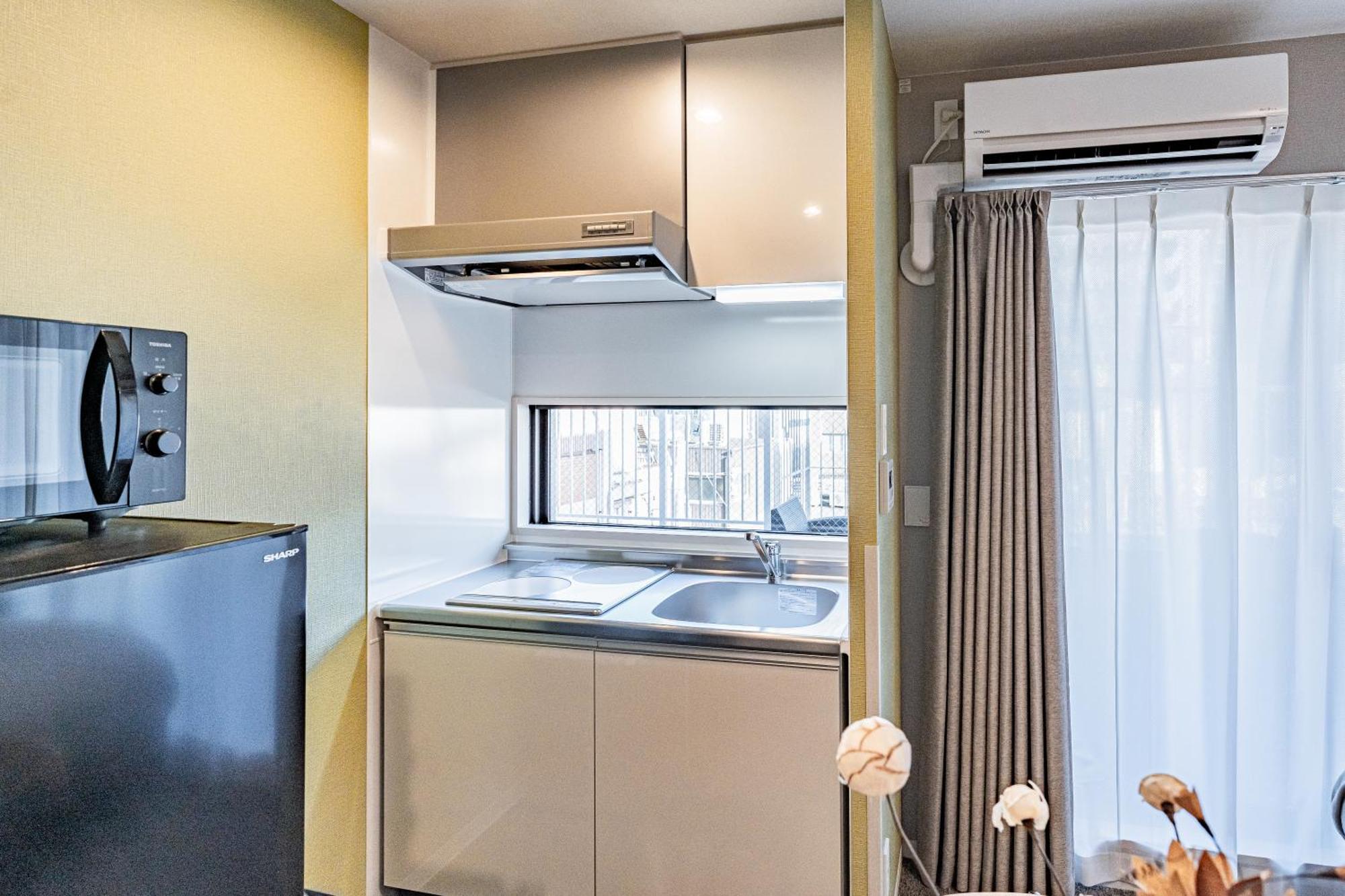 Apartment Hotel 11 Umeda Kamiyama Osaka Exterior photo